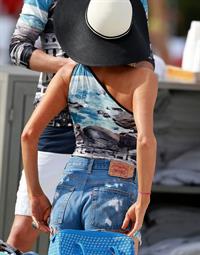 Paris Hilton spends the day in and out of the pool in Miami December 8, 2012