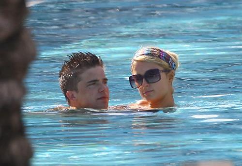 Paris Hilton poolside at their Miami hotel December 7-2012 