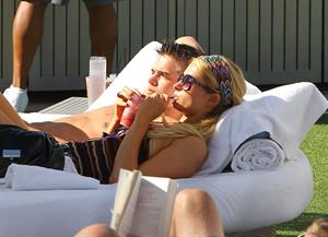 Paris Hilton poolside at their Miami hotel December 7-2012 