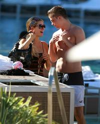 Paris Hilton poolside at their Miami hotel December 7-2012 