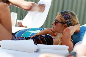 Paris Hilton poolside at their Miami hotel December 7-2012 