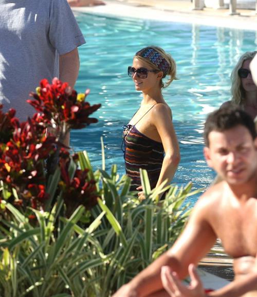 Paris Hilton poolside at their Miami hotel December 7-2012 