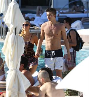 Paris Hilton poolside at their Miami hotel December 7-2012 