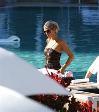 Paris Hilton poolside at their Miami hotel December 7-2012 