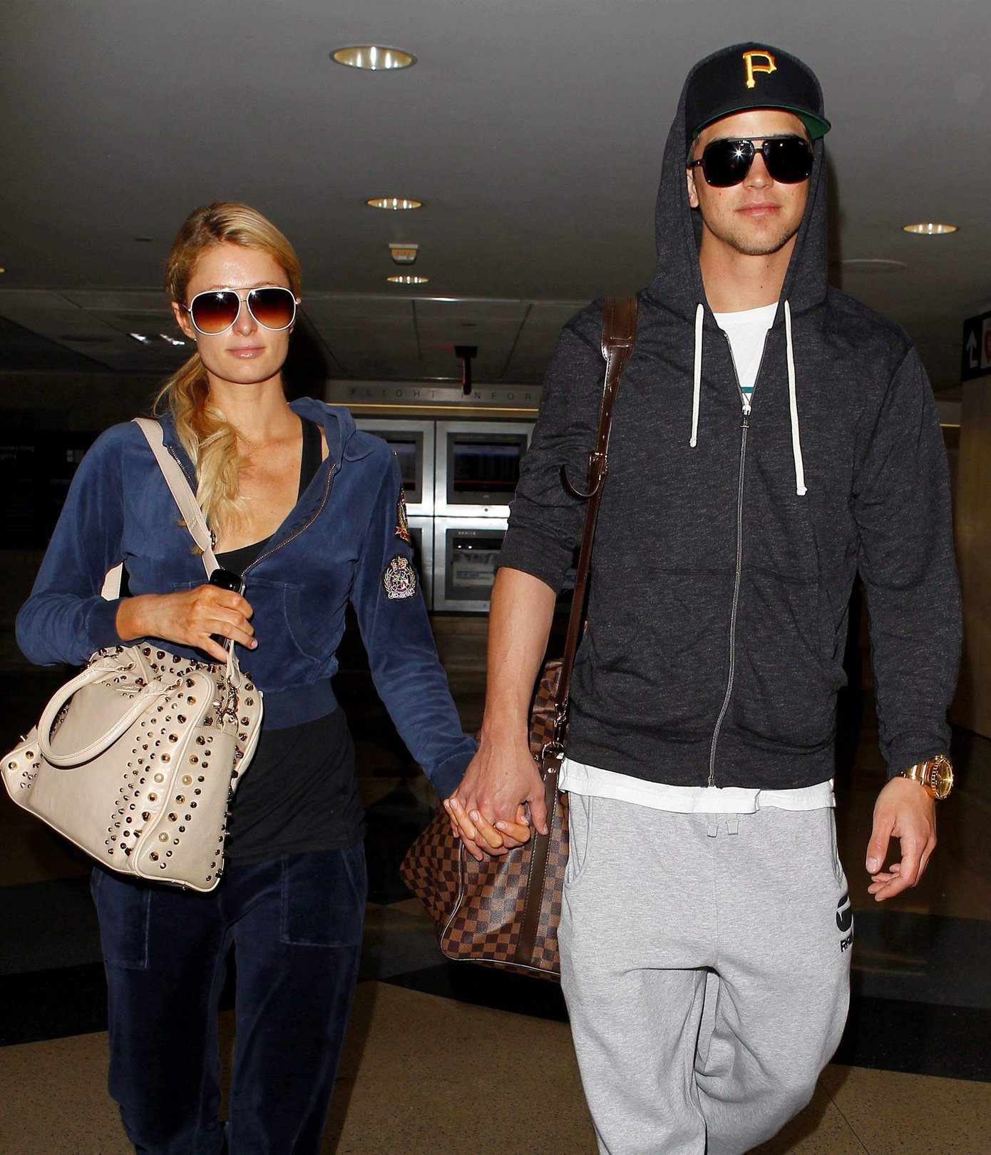 Paris Hilton and River Viiperi holding hands at LA. December 10, 2012 