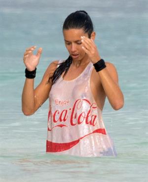 Adriana Lima – beach shoot candids in Cancun 12/2/13 