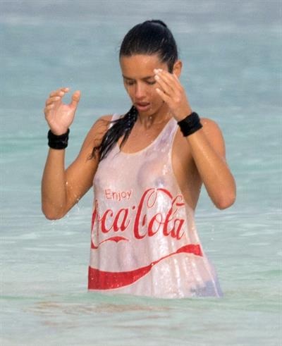 Adriana Lima – beach shoot candids in Cancun 12/2/13 