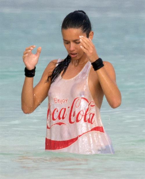 Adriana Lima – beach shoot candids in Cancun 12/2/13 