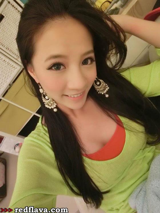 Lin Cai Ti taking a selfie