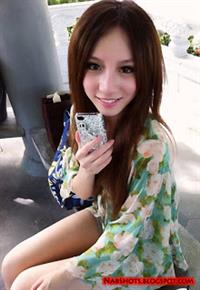 Lin Cai Ti taking a selfie
