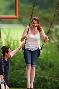 Alyson Hannigan playing in a park in Atlanta July 28, 2011 