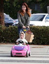 Alyson Hannigan Hangs out with her daughter in Los Angeles (November 22, 2013) 