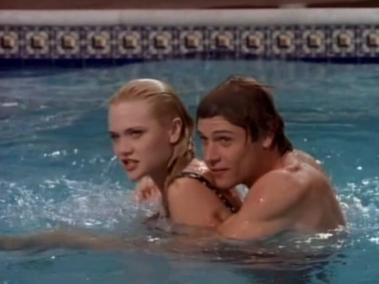 Amy Locane in a bikini