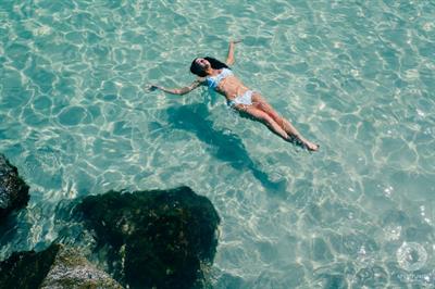 Nicole Harrison in a bikini