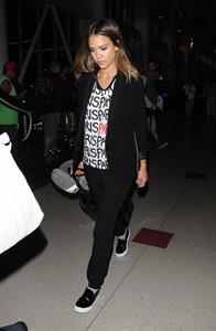Jessica Alba arriving at LAX August 05, 2014