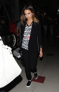 Jessica Alba arriving at LAX August 05, 2014