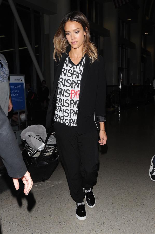 Jessica Alba arriving at LAX August 05, 2014