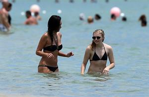Chloe Grace Moretz candids in a Black Bikini in Miami Beach
