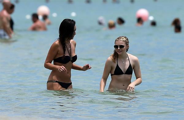 Chloe Grace Moretz candids in a Black Bikini in Miami Beach