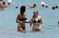 Chloe Grace Moretz candids in a Black Bikini in Miami Beach