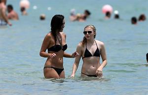 Chloe Grace Moretz candids in a Black Bikini in Miami Beach
