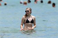 Chloe Grace Moretz candids in a Black Bikini in Miami Beach