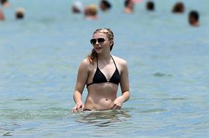 Chloe Grace Moretz candids in a Black Bikini in Miami Beach
