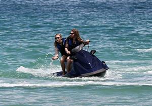 Chloe Grace Moretz candids in a Black Bikini in Miami Beach