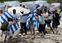 Chloe Grace Moretz candids in a Black Bikini in Miami Beach