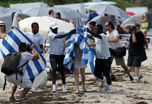 Chloe Grace Moretz candids in a Black Bikini in Miami Beach