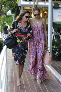 Jennifer Lopez and Leah Remini shopping at Fred Segal in Los Angeles on July 30, 2014