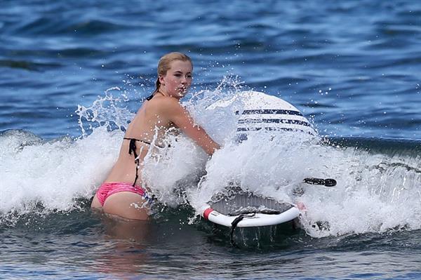Ireland Baldwin goes paddle-boarding in Hawaii with her boyfriend Slater Trout May 26, 2013 