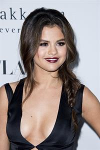 Selena Gomez showing off a ton of cleavage at Flaunt Magazine Release Party in Beverly Hills - Los Angeles - November 7, 2013 