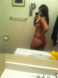 Anonymous taking a selfie and - breasts