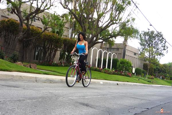 Denise Milani Snapshots - Bicycle