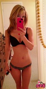 Anonymous in lingerie taking a selfie