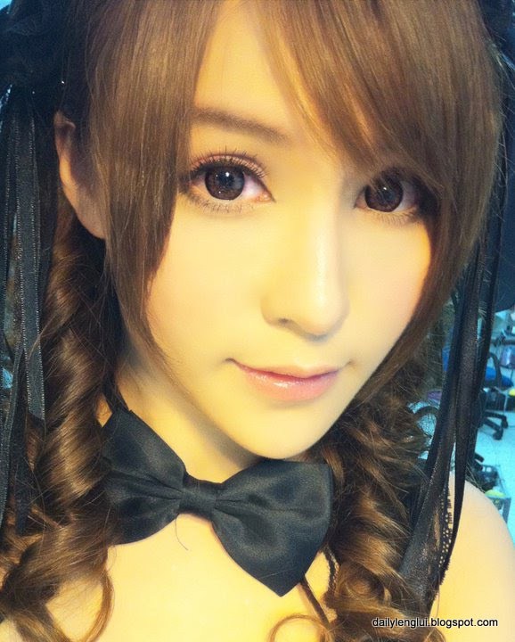 Mia Chan in a bikini taking a selfie