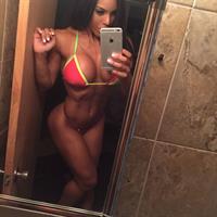 Yarishna Ayala Otero in a bikini taking a selfie