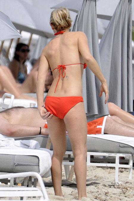 Jenny McCarthy in an orange bikini