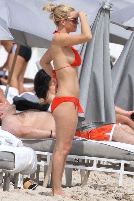 Jenny McCarthy in an orange bikini