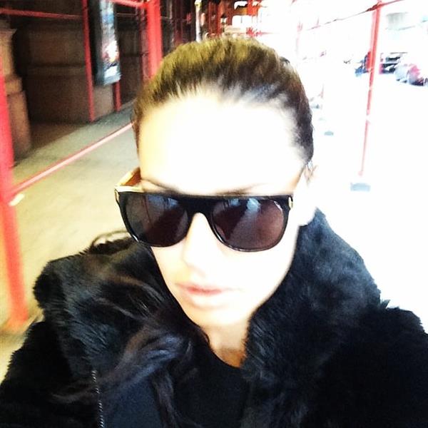 Adriana Lima taking a selfie