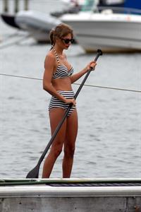 Taylor Swift paddleboarding in Westerly, Massachusetts 7/28/13 