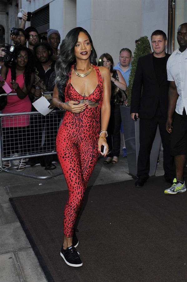 Rihanna - Shows off her toned physique in London in a $198 Adidas Originals Opening Ceremony (19.07.2013) 