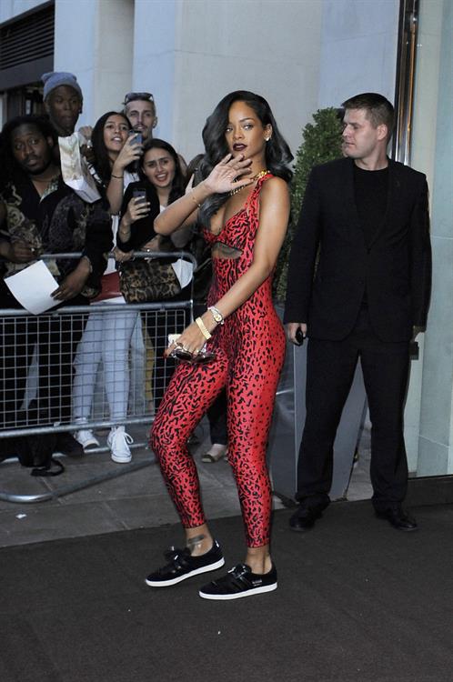 Rihanna - Shows off her toned physique in London in a $198 Adidas Originals Opening Ceremony (19.07.2013) 