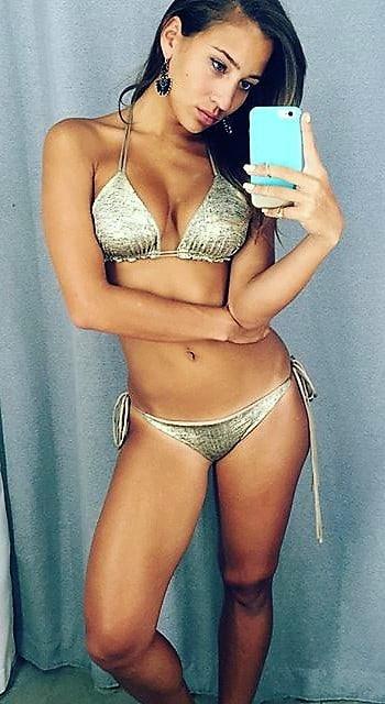 Vicky Justiz in a bikini taking a selfie