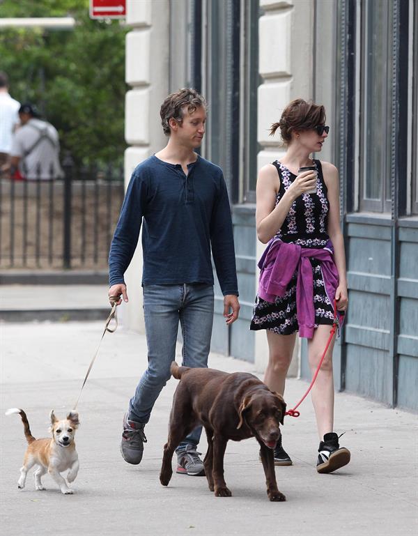 Anne Hathaway out walking with her husband in New York City
