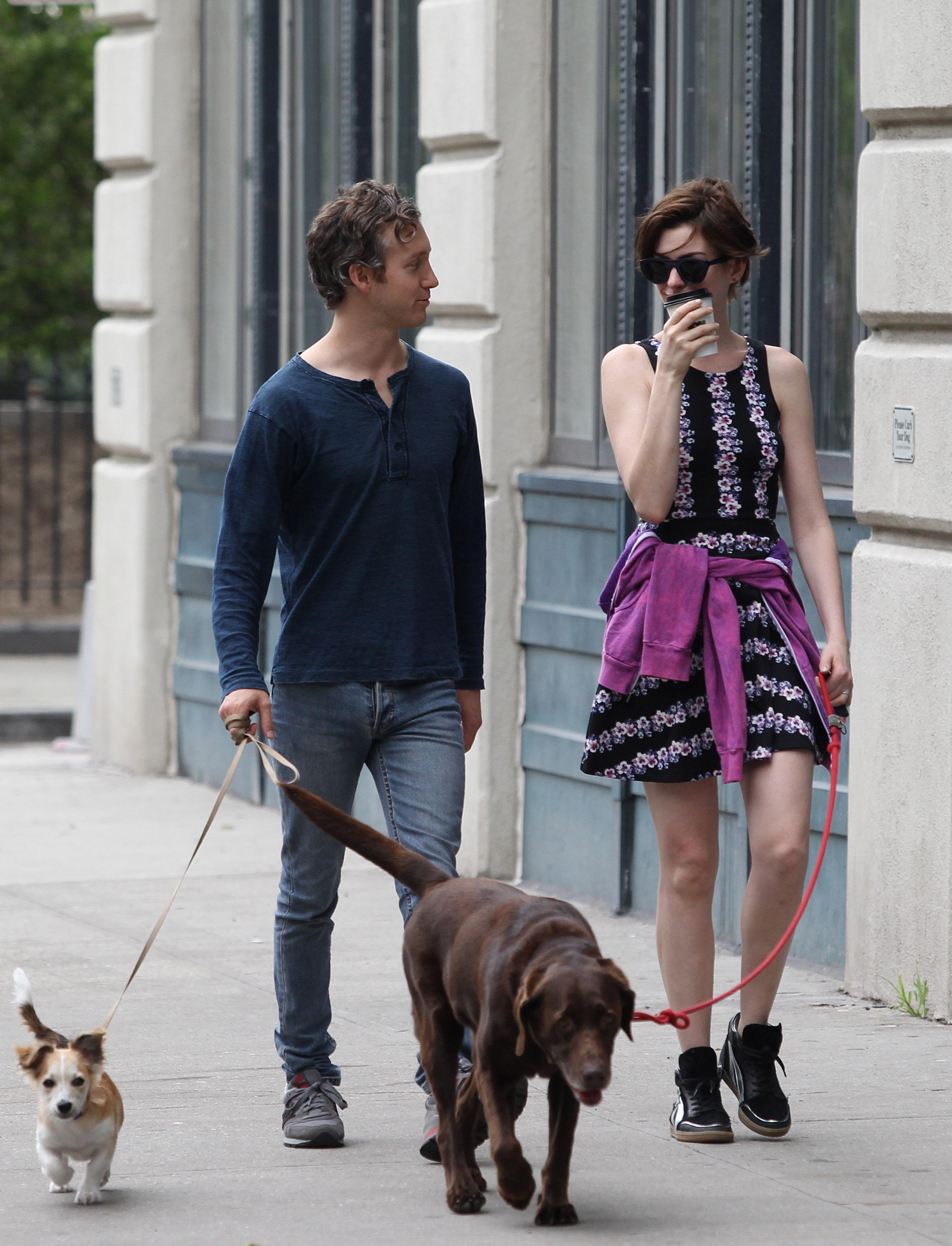 Anne Hathaway out walking with her husband in New York City