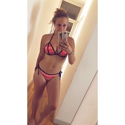 Charlotte in a bikini taking a selfie