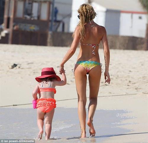 Abigail Clancy in a bikini - ass