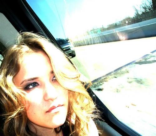 Emily Osment taking a selfie